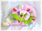 Preview: Fuxis Baby-Bettschlange rosa grün